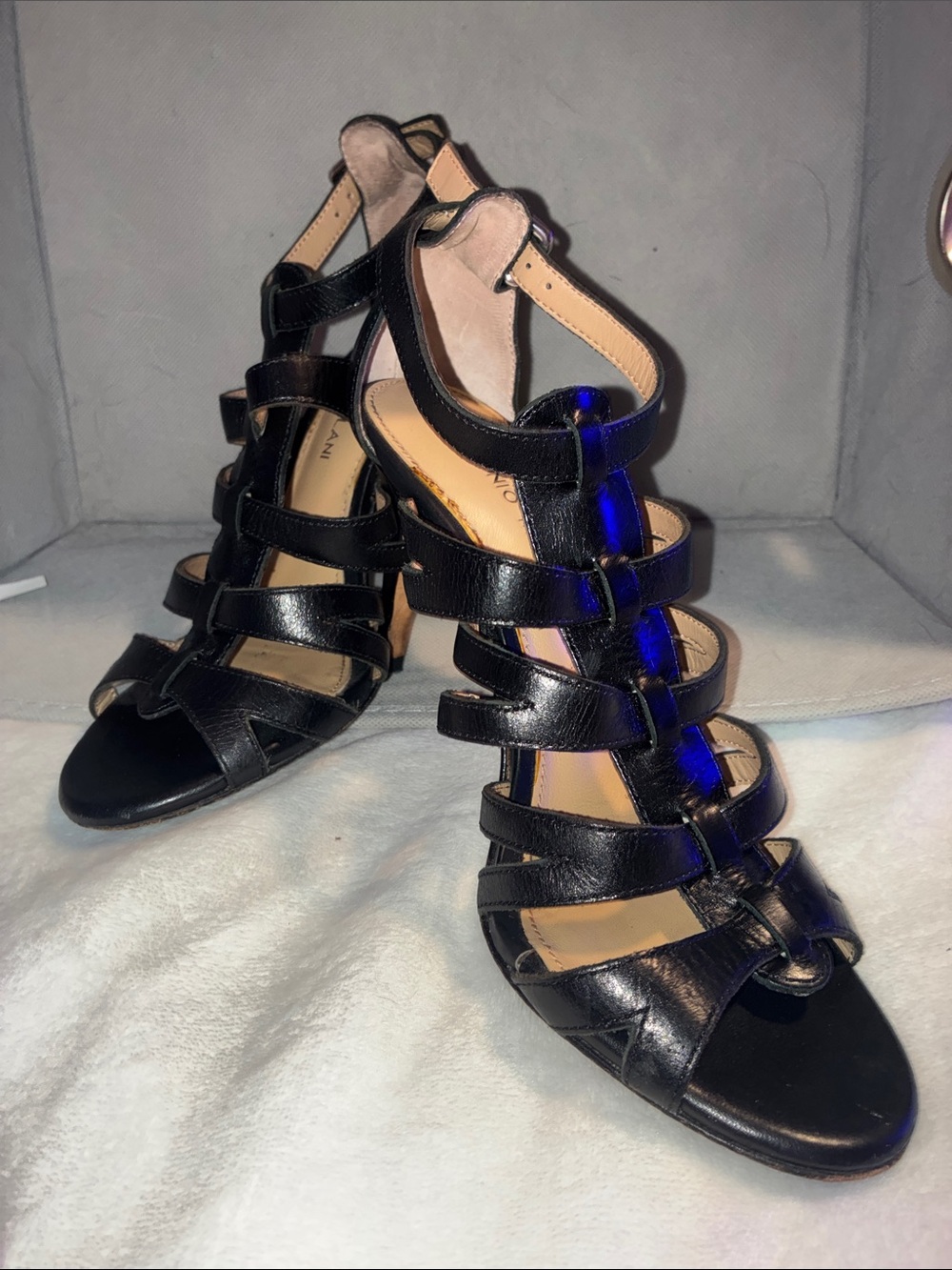 Antonio Melani Heels strappy gladiator sandals with a secure ankle buckle.